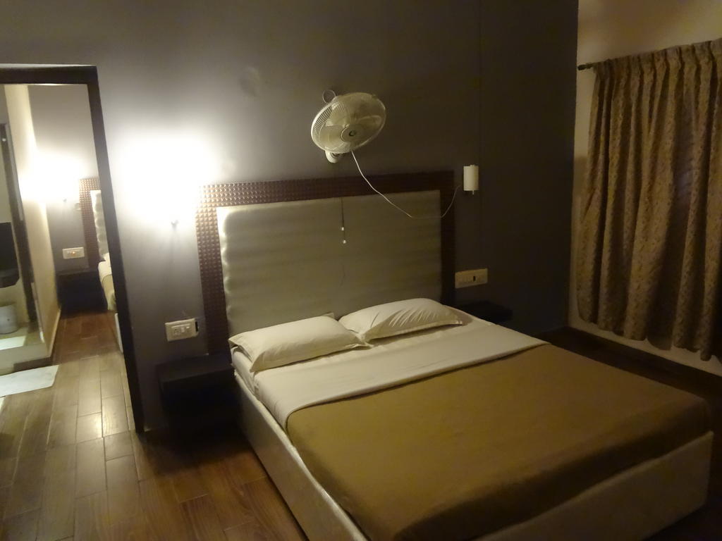 Hotel New Rajdarshan Madikeri Rom bilde