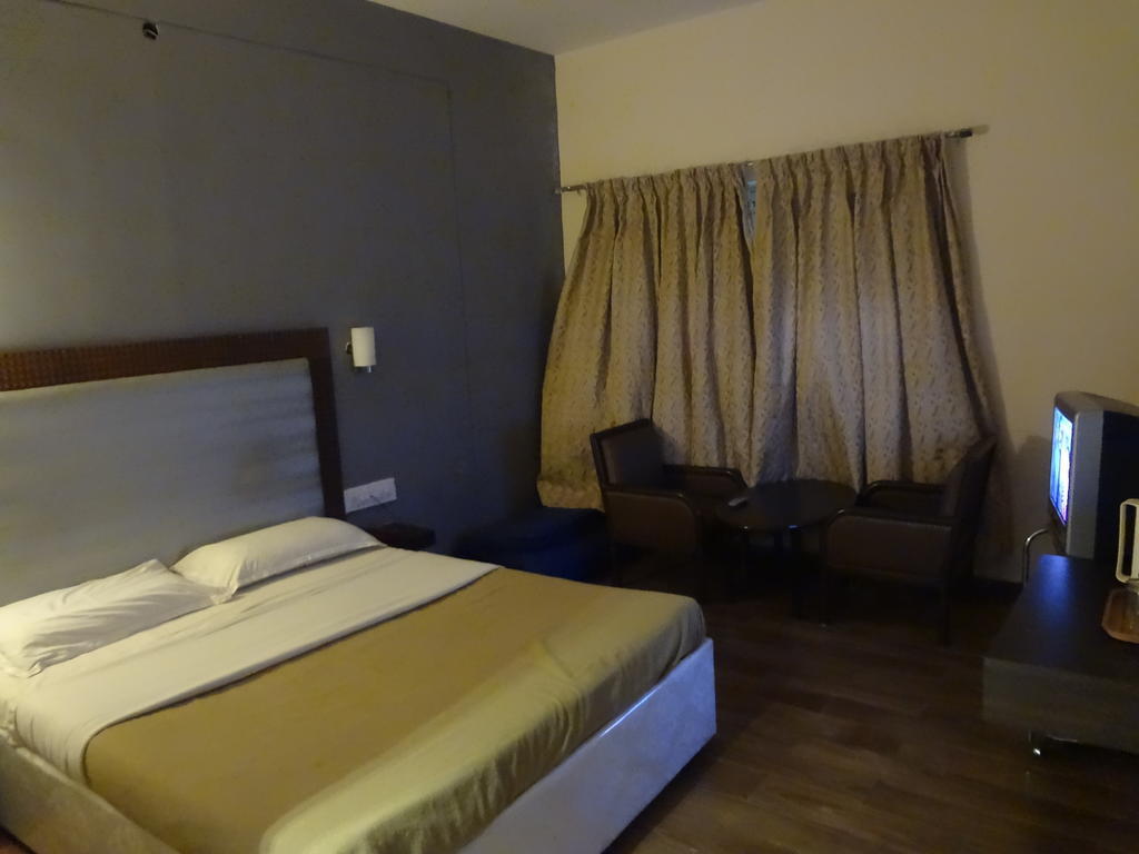 Hotel New Rajdarshan Madikeri Rom bilde
